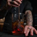 Joe Dietrich, bar manager at Civility & Unrest, stirs a cocktail. Courtesy photo