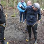 Executive Dow Constantine puts on his executive hip waders for a tour of the river restoration site (Cameron Sheppard/Sound Publishing)