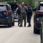 Oak Harbor Police Department photo
Officers arrest Tyler Dinsmoor at his home Friday morning.