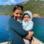 Joanna Paul holds her son. Courtesy of Sleepy Little Nugget.