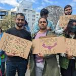 A group holds signs at the reproductive rights protest on May 14, 2022 at Cal Anderson Park. Hannah Saunders/Sound Publishing