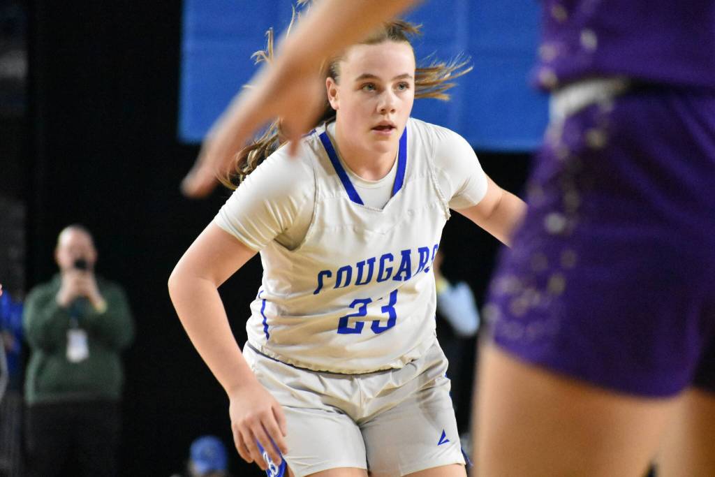 Sam Brooke dribbles the basketball for the Bothell Cougars. Ben Ray / The Reporter